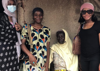 Community Service Day: Aisha Kande Residents Put a Smile on a Widow’s Face